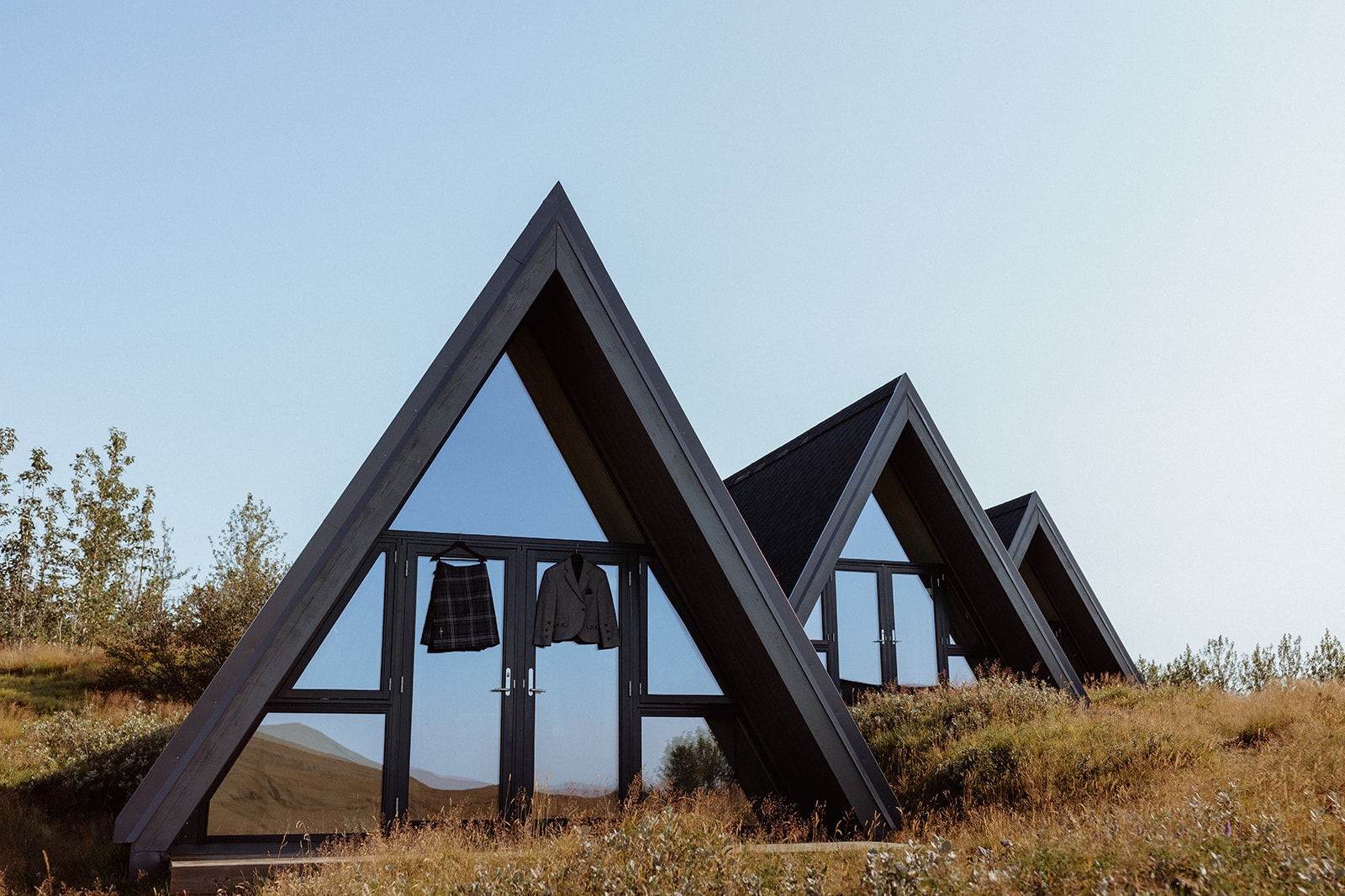 Tom's traditional kilt hanging in the peaceful surroundings of Eirð Retreat, a tribute to his Scottish heritage before the Icelandic elopement.