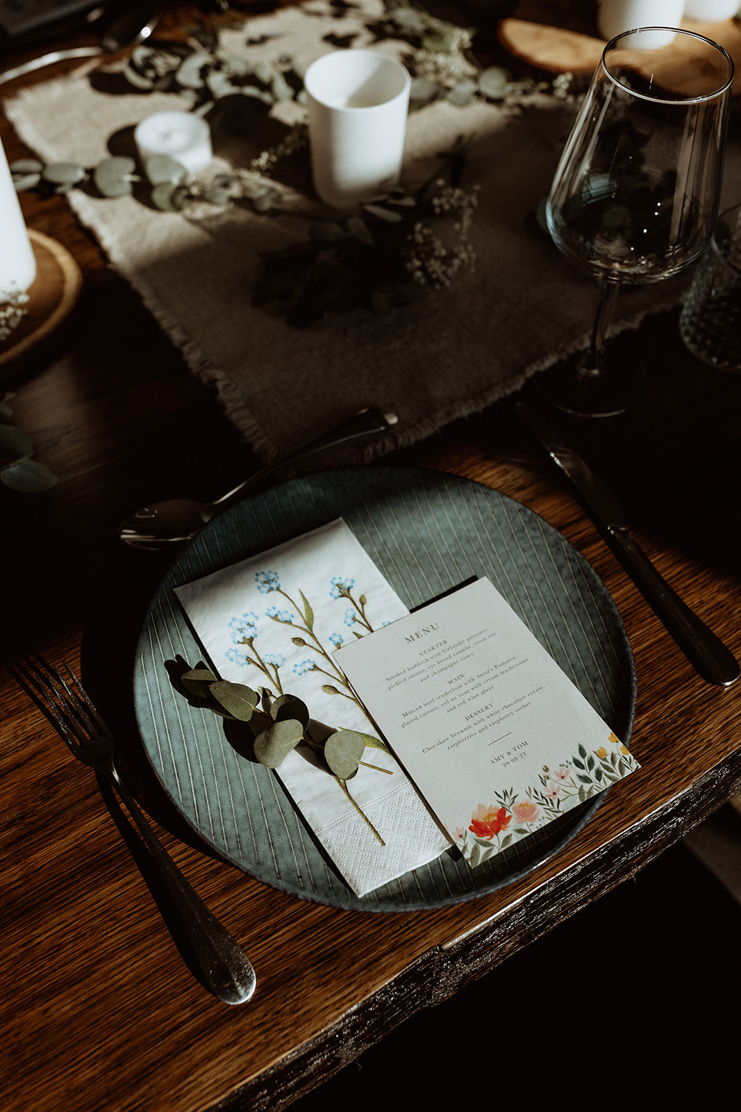 Close-up of the wedding menu in harsh light, showcasing the elegant design and details in preparation for the Icelandic elopement dinner