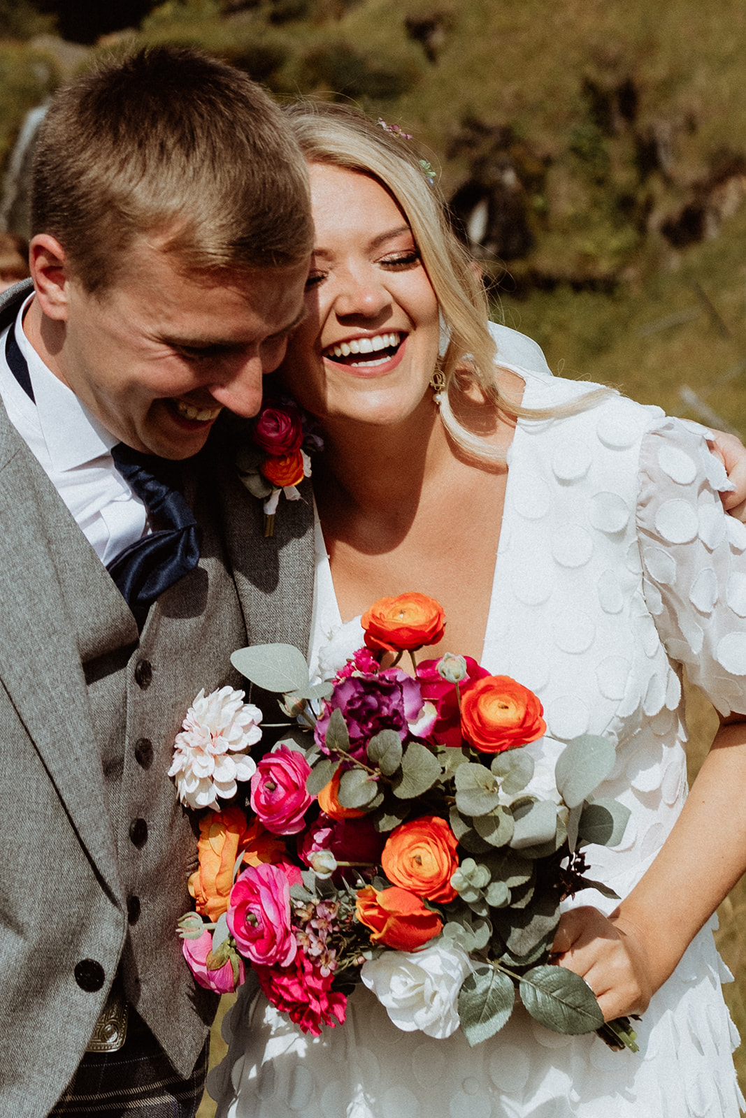 Close-up of the bride’s joyful face as she stands with her partner during their emotional Iceland elopement ceremony.