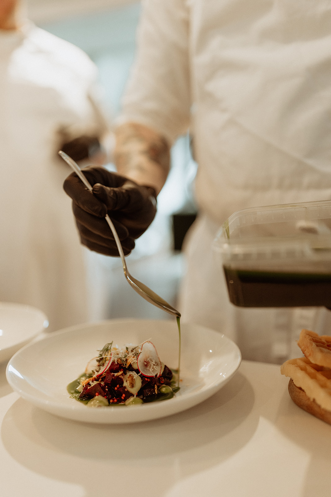 Close-up of the meticulous food preparation for the wedding reception, showcasing the artistry and attention to detail in the fine dining experience at Eirð Retreat