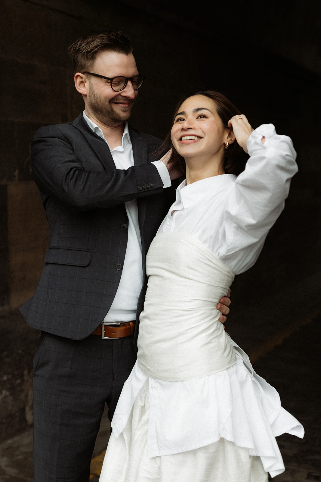 Intimate documentary engagement session of a couple walking together through Edinburgh’s romantic streets.