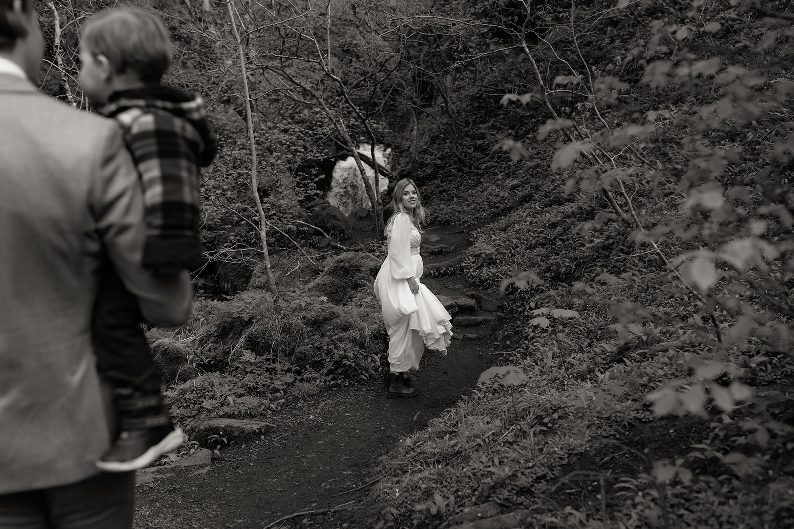 Bride looking back over her shoulder during Isle of Skye elopement