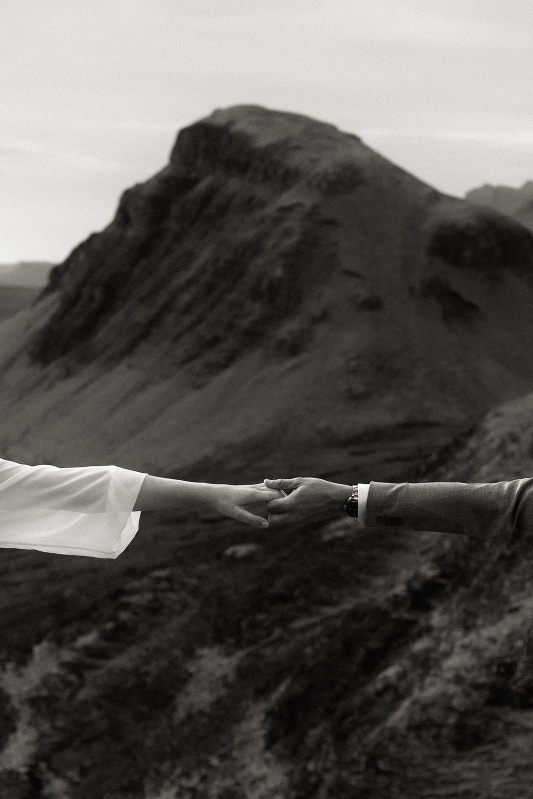 Close-up of couple holding hands during their Isle of Skye elopement