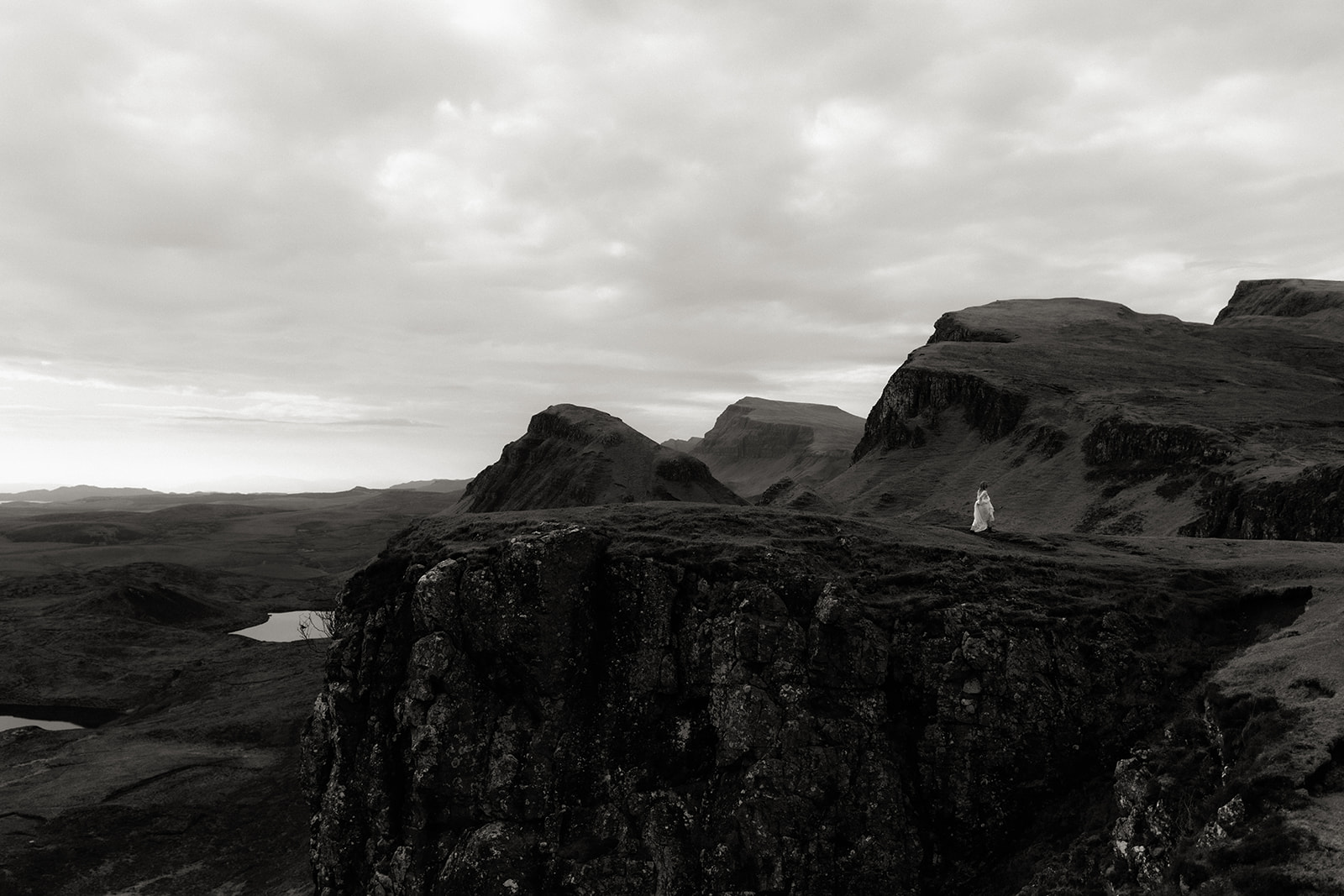 : Eloping couple enjoying expansive views over the Quiraing on the Isle of Skye