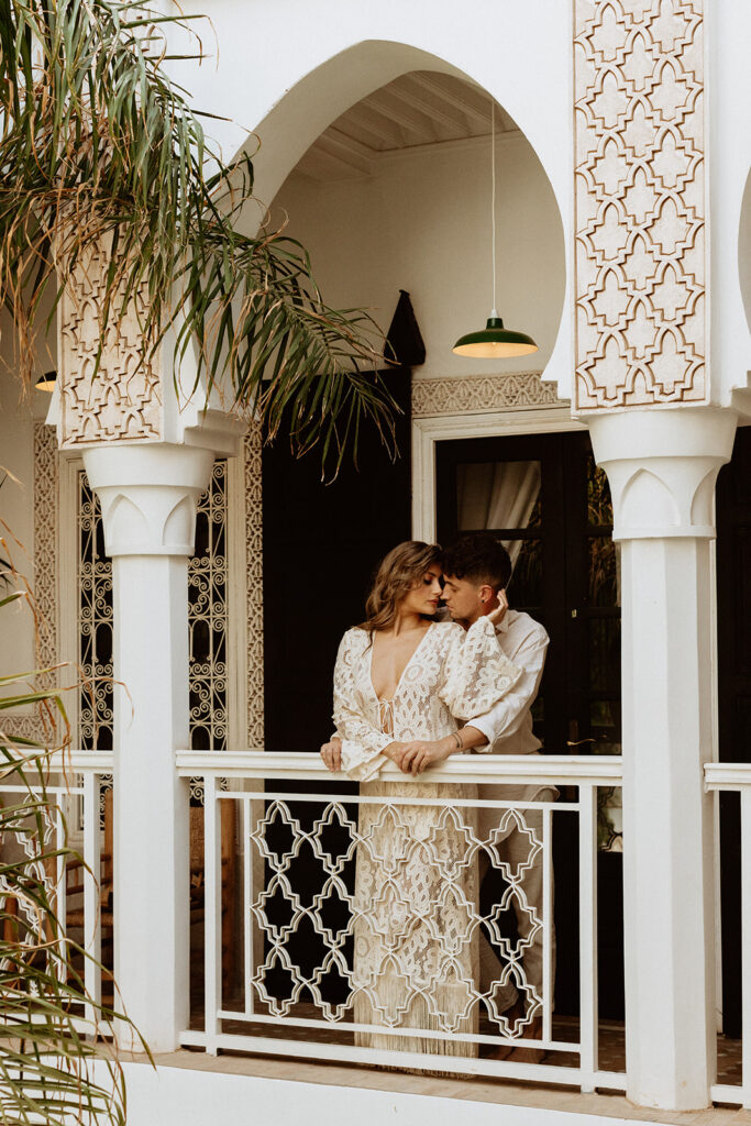 Couple on balcony in Marrakesh riad