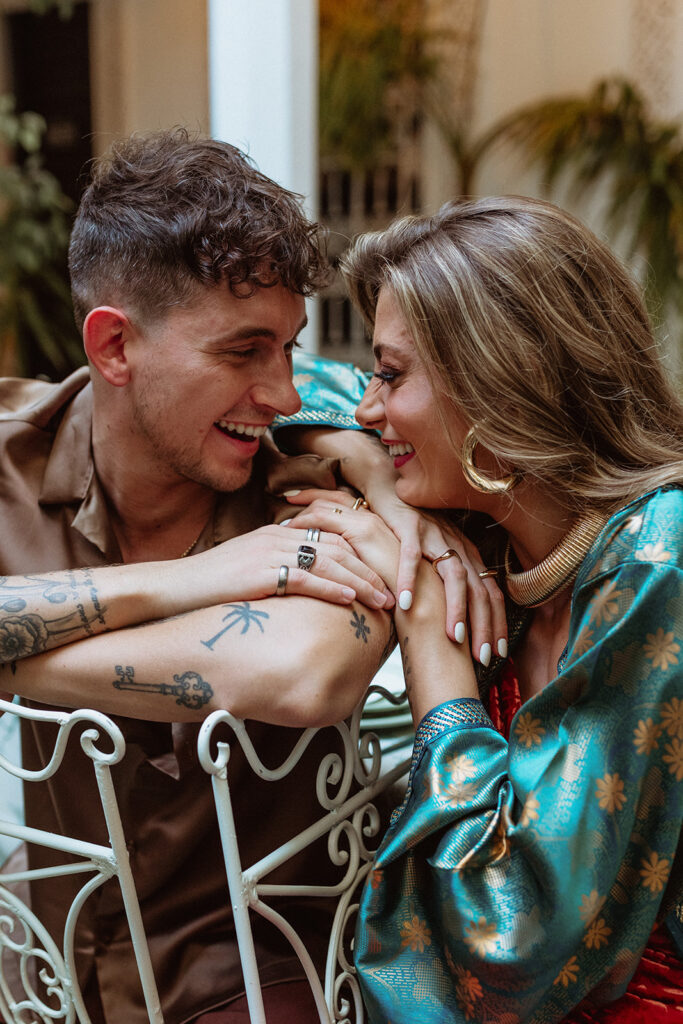 Couple laughing together at a riad in Marrakesh