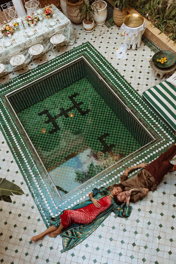 Aerial view of turquoise pool at Le Riad Yasmine in Marrakesh courtyard