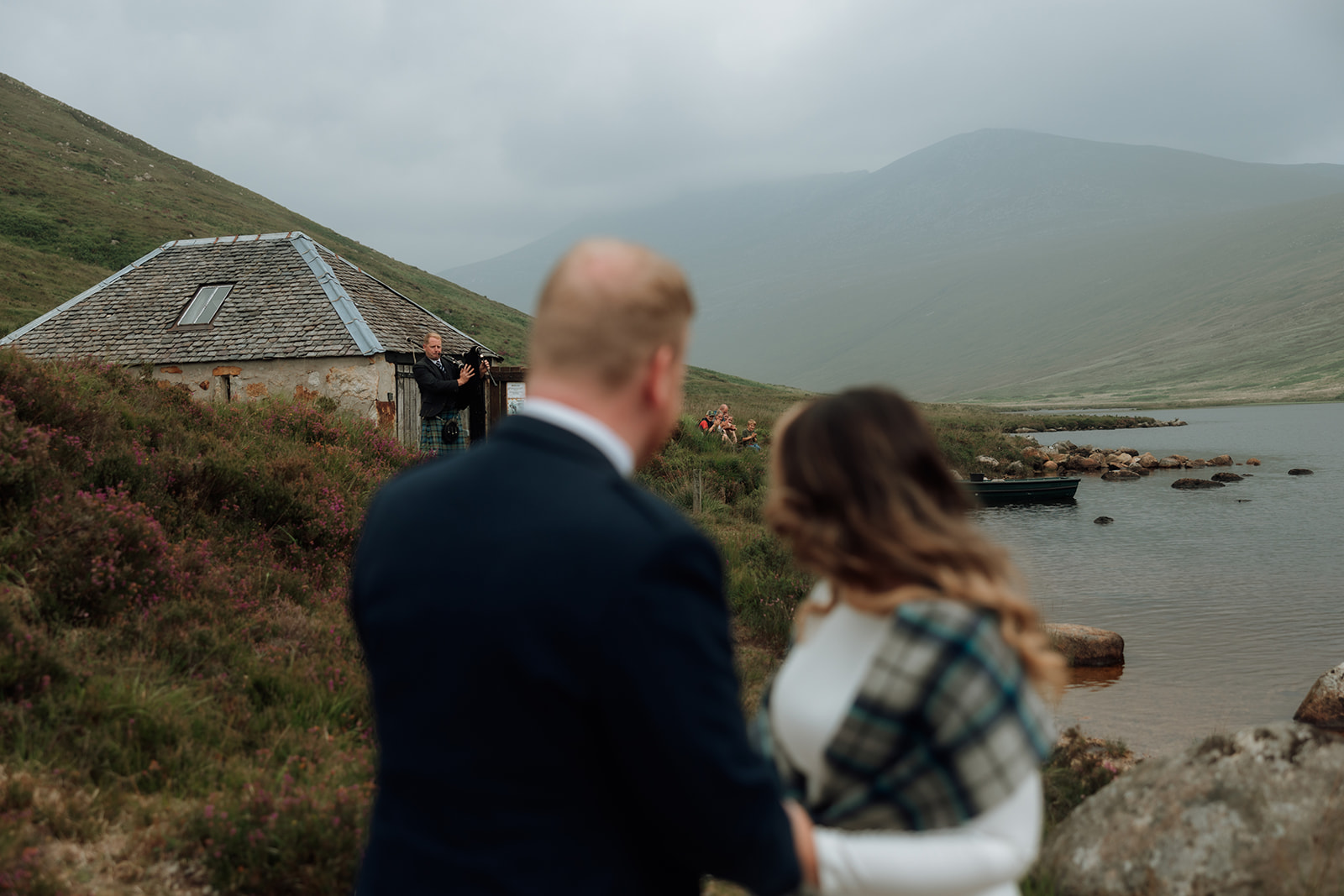 Hikers watching elopement ceremony on the Dougarie Estate, Isle of Arran.