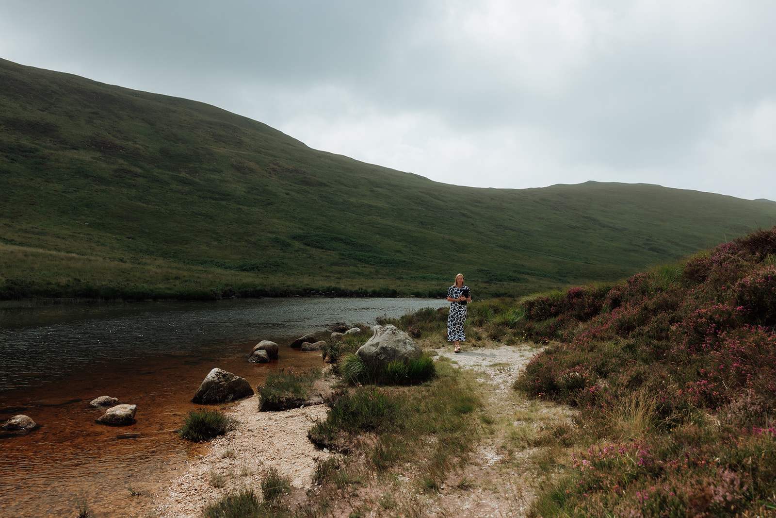 Celebrant standing on the shore of Loch Iorsa, Isle of Arran.