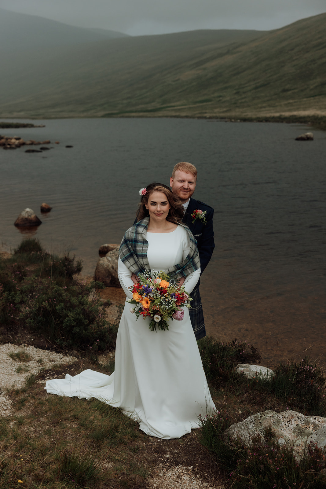 Bride and groom standing side by side during Isle of Arran elopement.