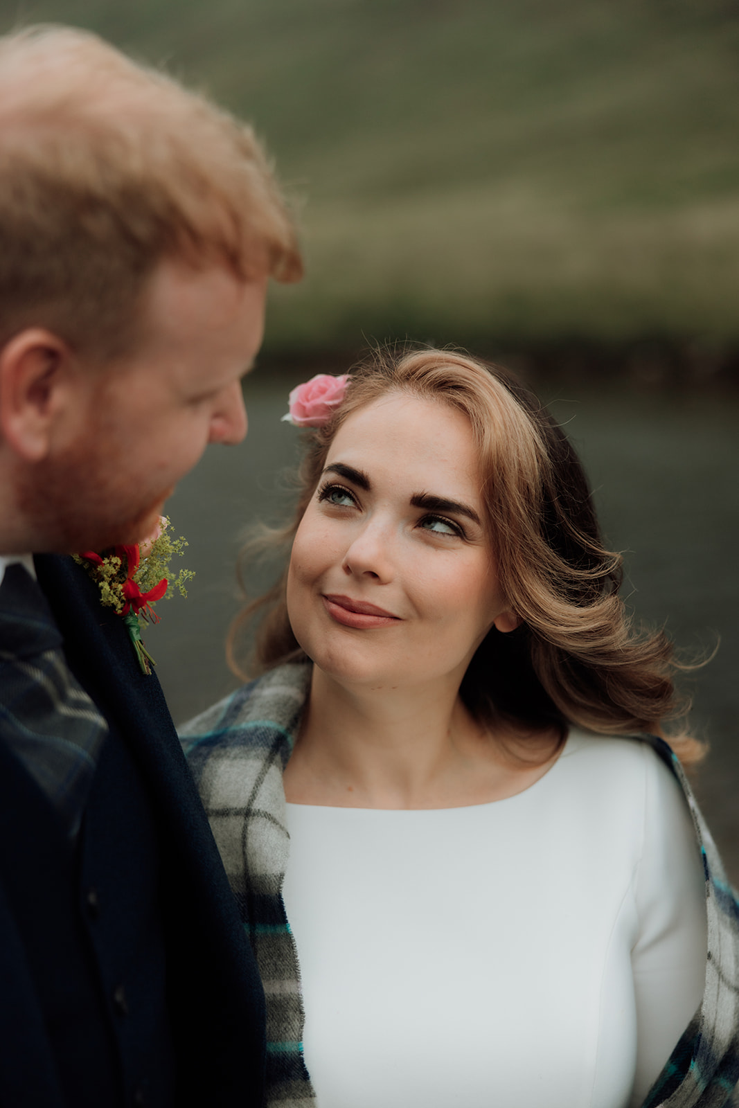 Groom looking at bride close-up portrait during Isle of Arran elopement.