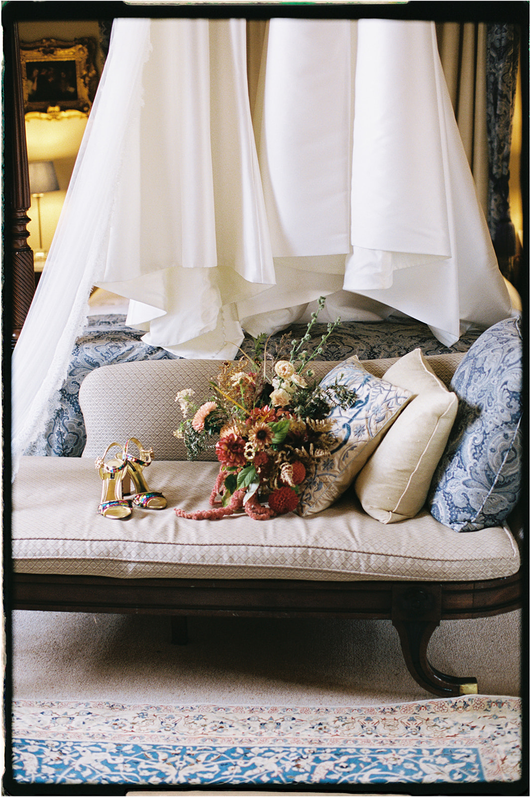 Romantic bouquet by Tupelo Tree styled on a vintage chaise longue in a Winton Castle bedroom.