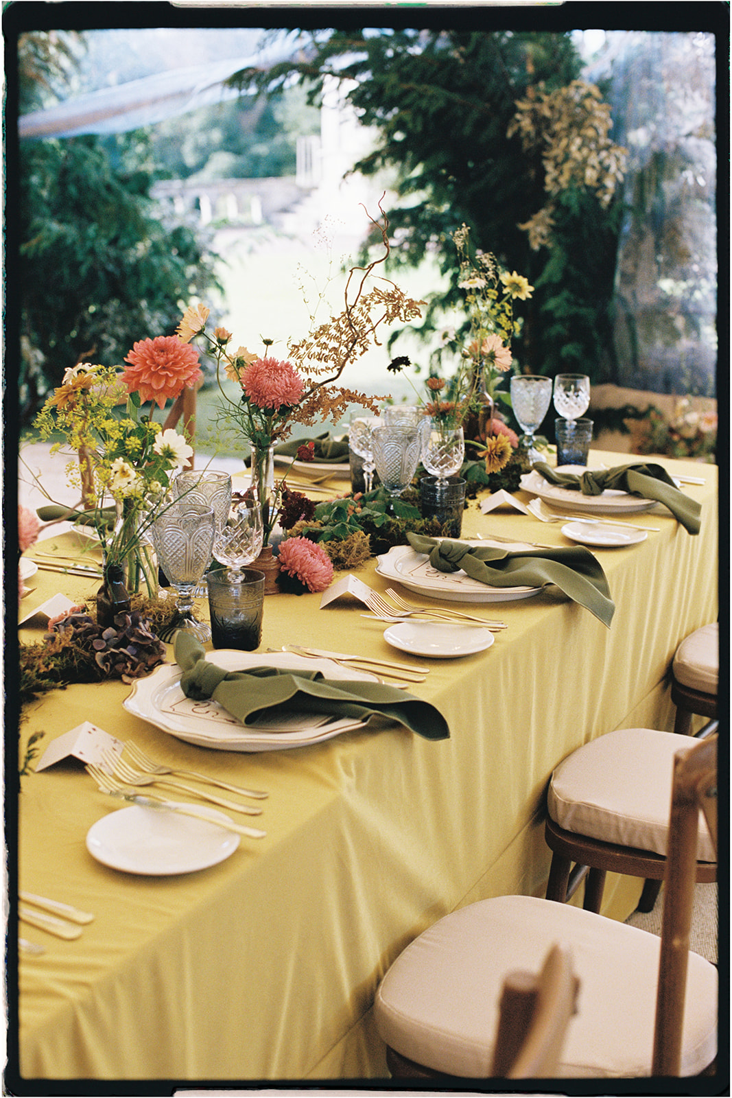 Editorial tablescape styled by Tupelo Tree with golden linen, sculptural florals, and organic textures, photographed on 35mm film in Scotland.